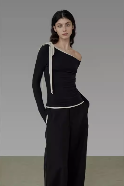 UNSPOKE撞色斜肩针织衫女2025春季新款修身显瘦打底衫长袖上衣